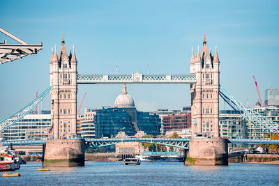 Iconic tower bridge connecting londong with southwark on the thames river