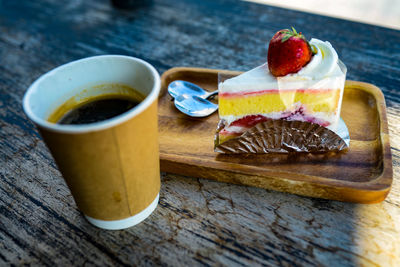 Close-up of cake served on table