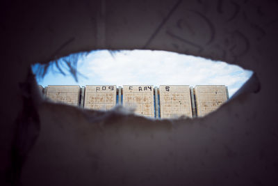 Close-up of text on wall at home