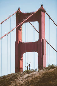 Mother daughter freedom in front of the golden gate bridge. single mom lige