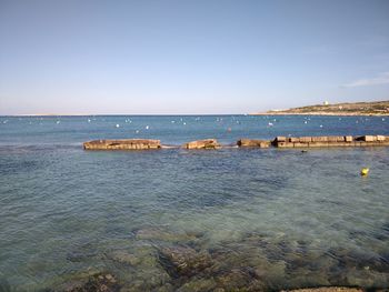 Scenic view of sea against clear sky