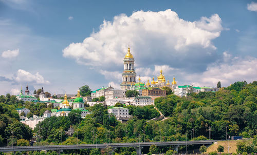 Buildings in city against sky