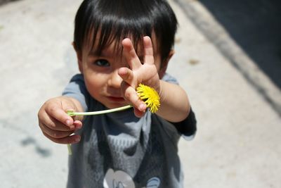 Close-up of boy playing outdoors