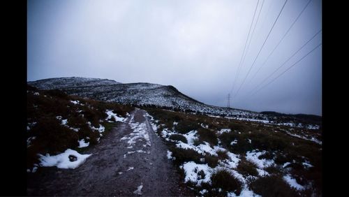 Snow covered mountain road