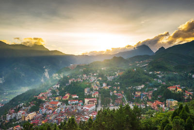 High angle view of townscape against sky during sunset