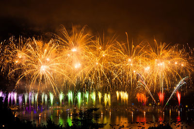 Firework display at night