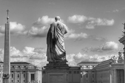 Low angle view of statue against cloudy sky