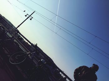 Low angle view of birds against sky