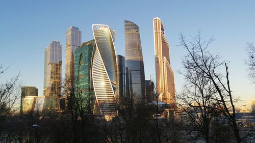 Low angle view of modern buildings against sky