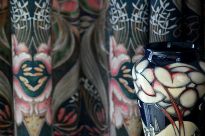 Close-up of painted vase for sale at market stall