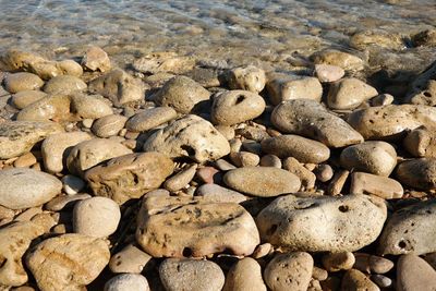 Full frame shot of pebbles on beach