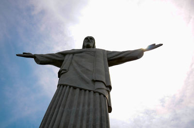 Low angle view of statue against sky