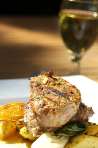 Close-up of served food in plate on table