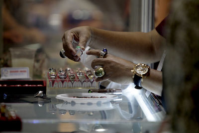 Close-up of person preparing food in kitchen