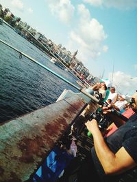 Low angle view of man on boat against sky