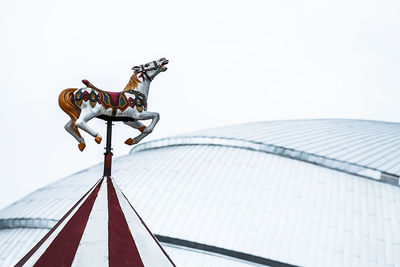 Low angle view of statue against clear sky