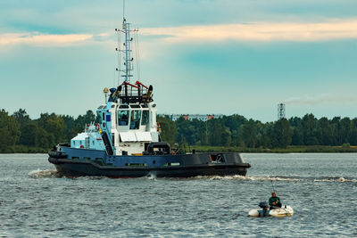 Boat in sea against sky