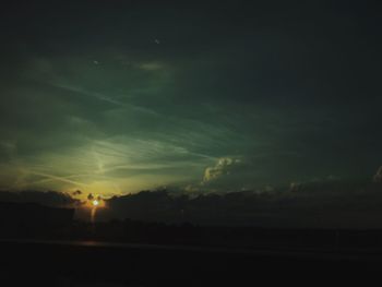 Scenic view of silhouette landscape against sky during sunset