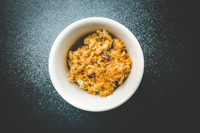 High angle view of food in bowl over black background