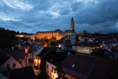 High angle view of buildings in city at night