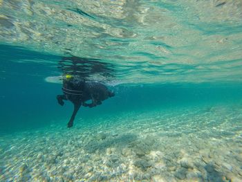 Person swimming in sea