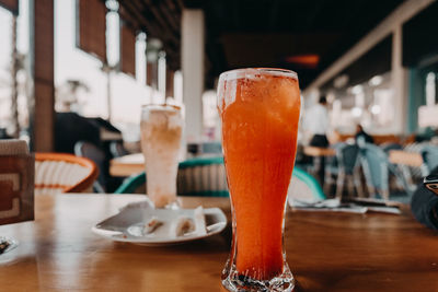 Close-up of beer glass on table in restaurant