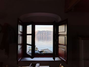 View of sea through window