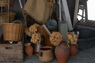 High angle view of baskets and flower pots