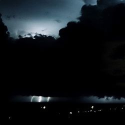 Silhouette of people at night