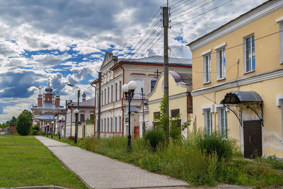 Buildings in city against sky