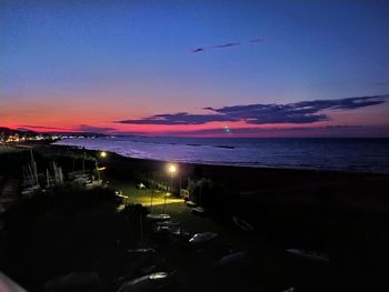 Scenic view of sea against sky at sunset