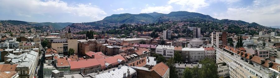 Panoramic view of cityscape against sky