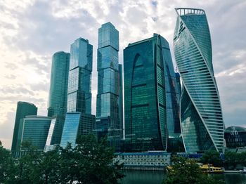 Low angle view of modern buildings against sky