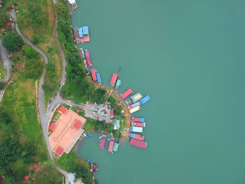 Aerial view of container ships moored at harbor