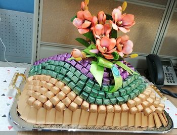 Close-up of multi colored flowers on table