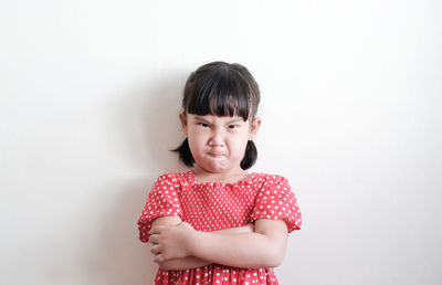 Portrait of a boy against white background
