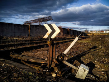 Train on railroad tracks against sky