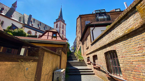 Exterior of buildings in city against sky