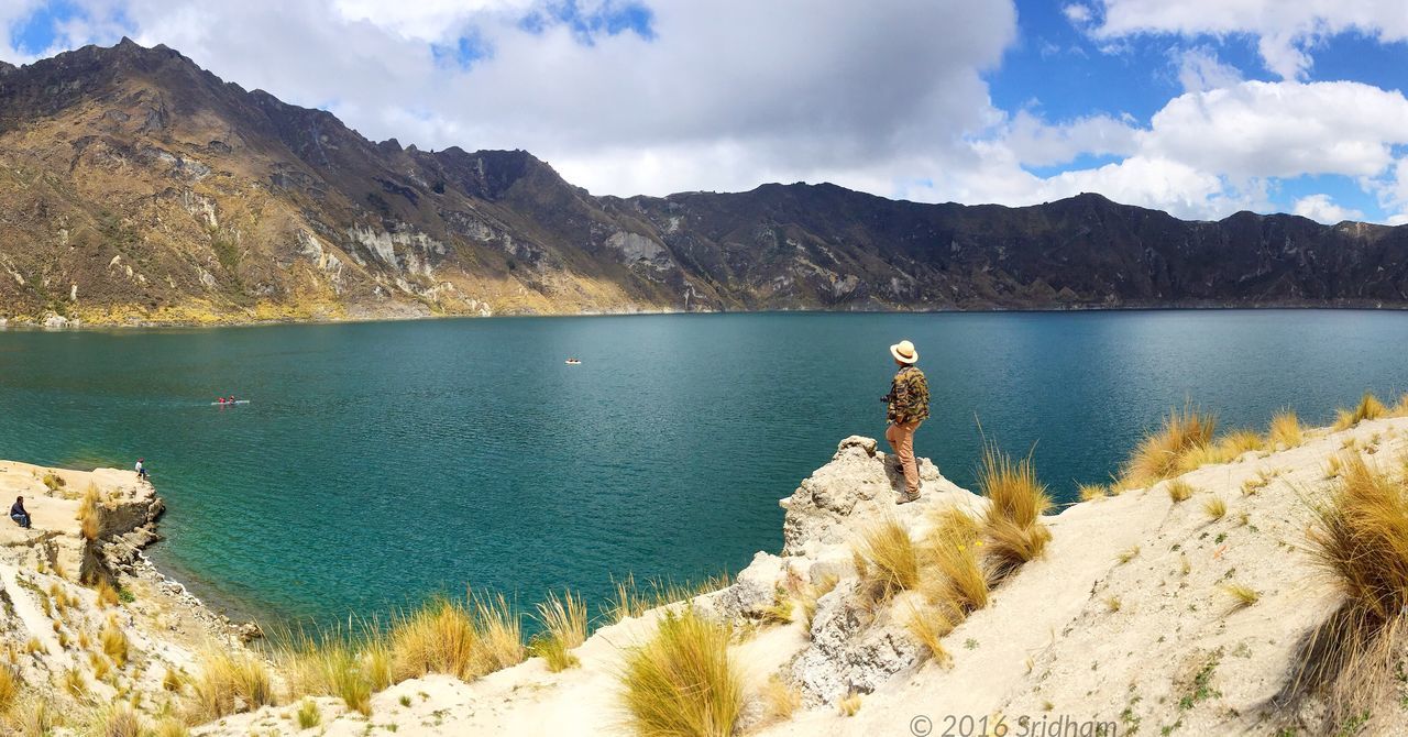 SCENIC VIEW OF LAKE AND MOUNTAINS