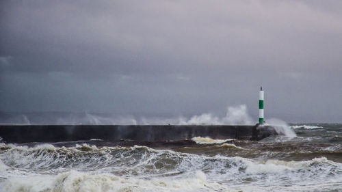 Waves breaking on shore