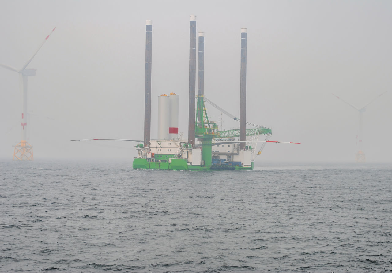 SHIP ON SEA AGAINST SKY