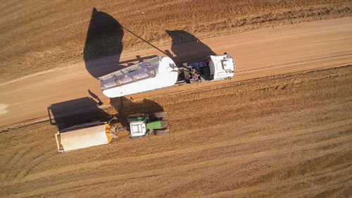 High angle view of road amidst field