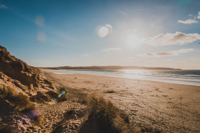 Scenic view of beach against sky