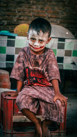 Portrait of a girl sitting on seat