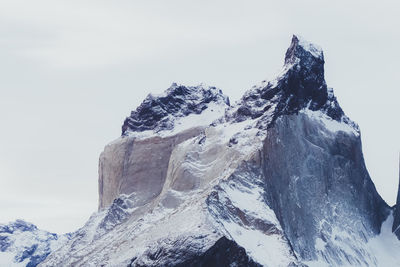 Snowcapped mountains against sky