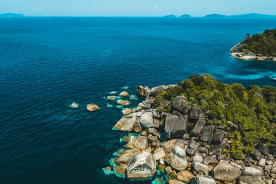 High angle view of rocks in sea