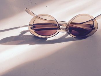 Close-up of sunglasses on table