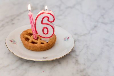 Close-up of cake served on table