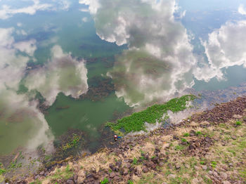 High angle view of land against sky