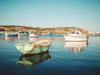 Boats moored in harbor